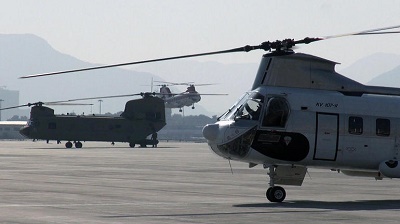 Helicopters await passengers at Kabul International Airport. The danger of the capital has made helicopter rides the safest way to and from the airport. CBS NEWS